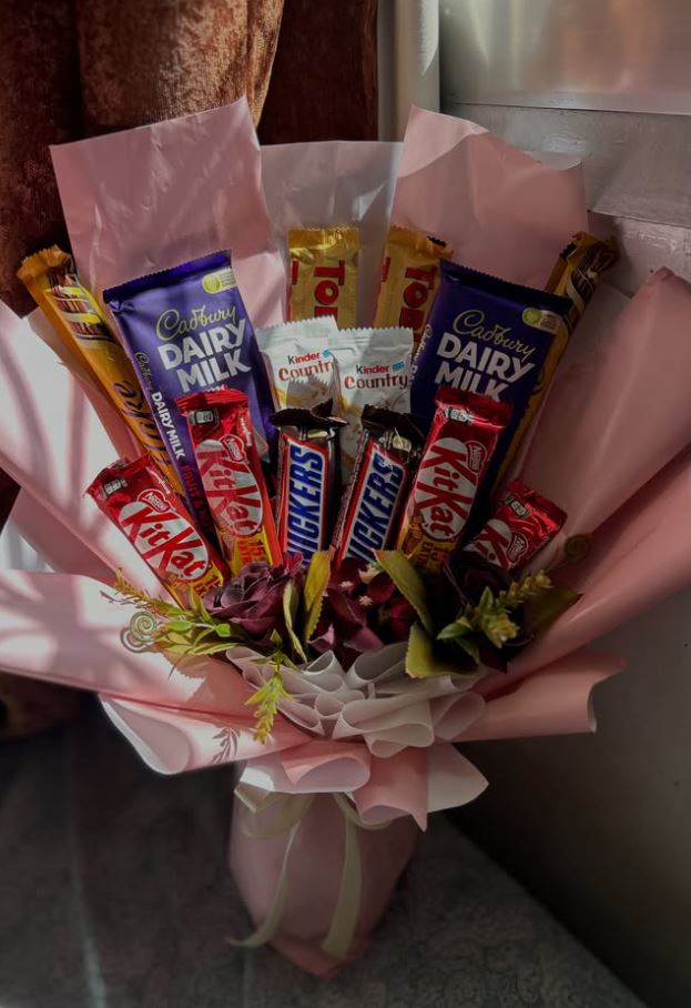 Elegant celebration hamper with roses and chocolates
